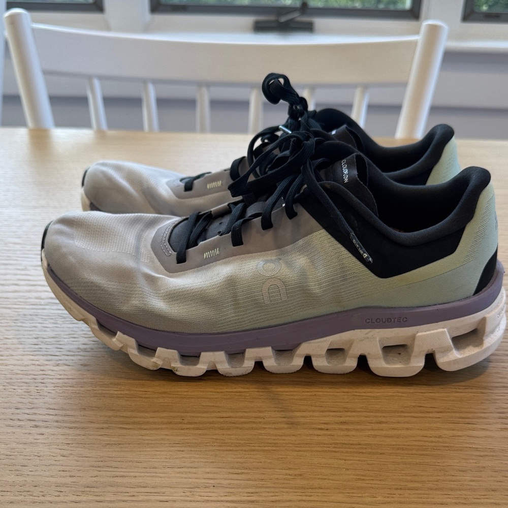 On Running Athletic Shoes in Black and White